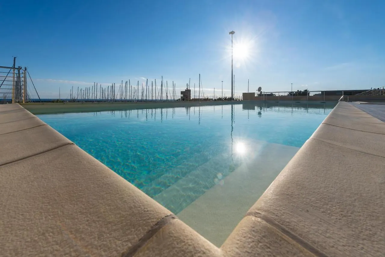 Апартаменты H11 Luxury 12B Porto - Piscina - Jacuzzi Санто-Стефано-аль-Мар Италия